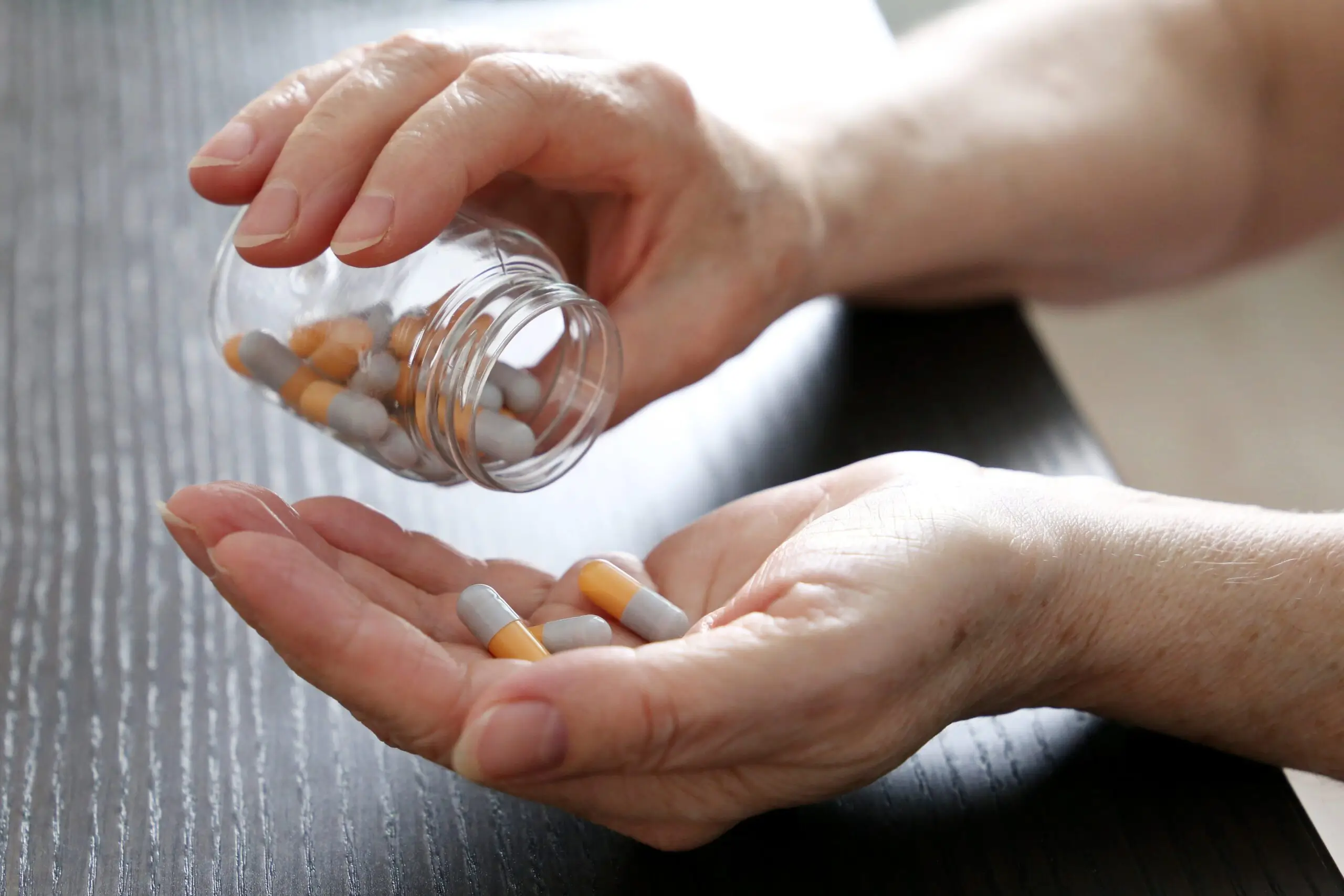 Person Holding Alzheimer's Drugs