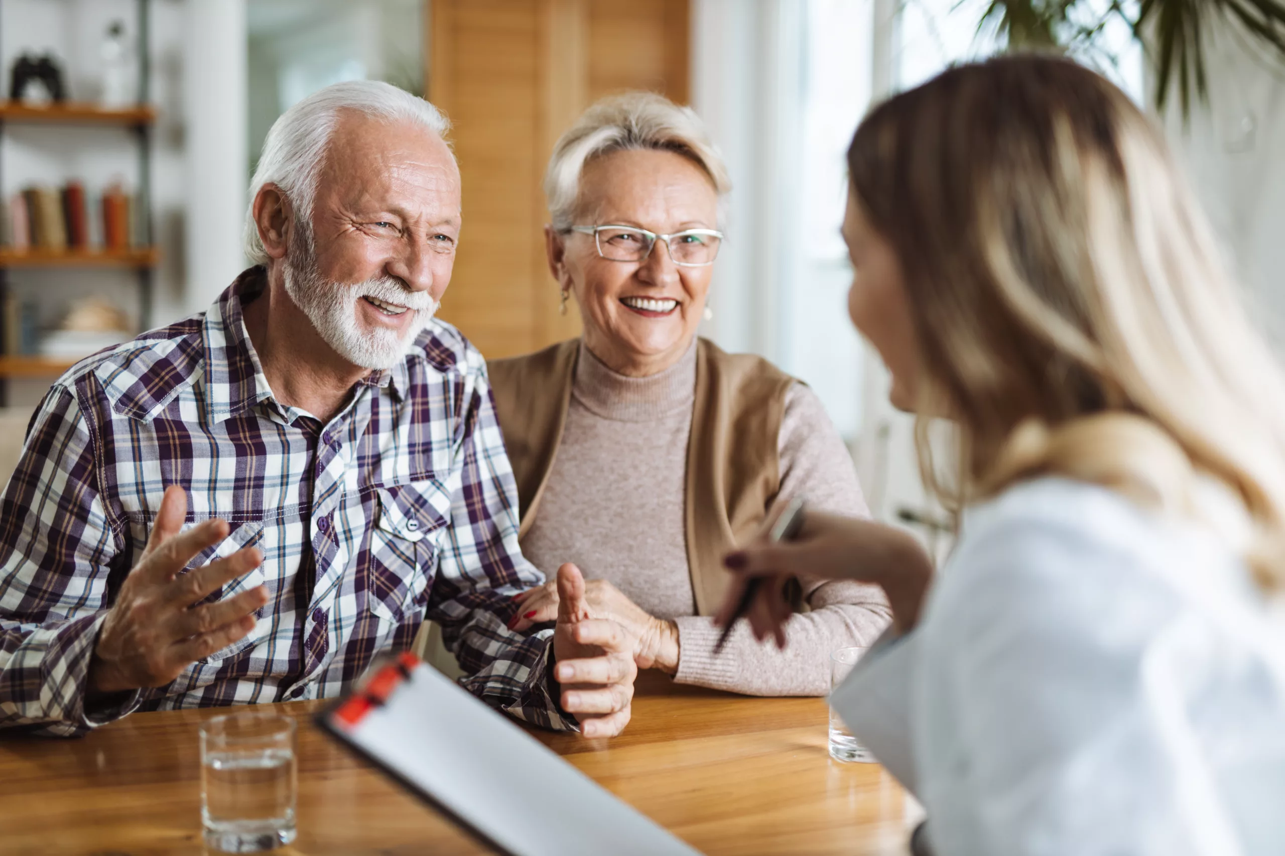 Elderly Couple Discussing Mental Health With Doctors